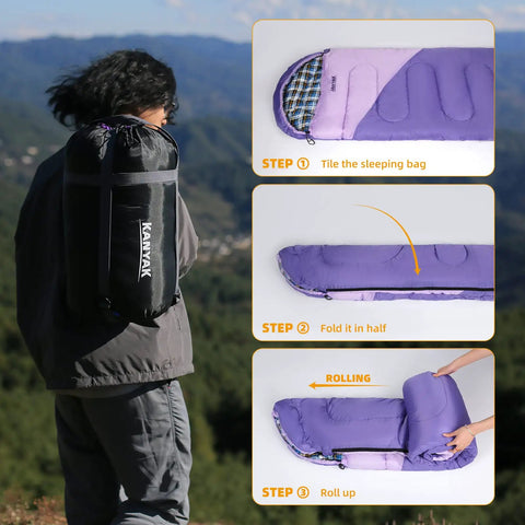 Person carrying Water-Resistant Portable Purple Sleeping Bag For Adults Teens And Kids, 86.6 Inch Long, in a compression sack