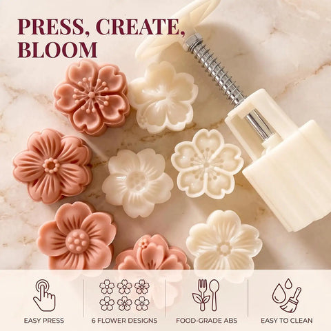 White Cherry Blossom Mooncake Mold With 30g Hand Press Cookie Stamp featuring six petal cookie designs on a marble surface.
