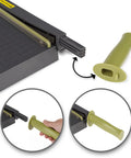 Detachable handle of ClassicCut Lite 12 Inch Guillotine Paper Cutter With 10 Sheet Capacity, showing assembly and green plastic material