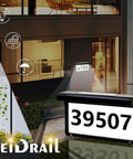 Solar Powered Address Sign With LED Illumination Auto Dusk To Dawn Sensor Weatherproof Outdoor Metal Plaque shown at night