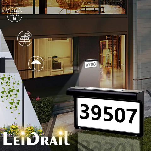 Solar Powered Address Sign With LED Illumination Auto Dusk To Dawn Sensor Weatherproof Outdoor Metal Plaque shown at night