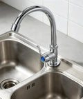 ibasenice Plastic Kitchen Water Faucet, Vertical Sink Tap with 2cm Base, installed on stainless steel sink.