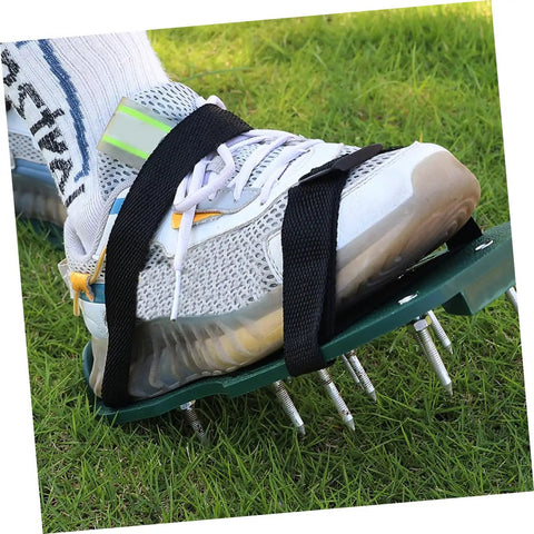 Person wearing 16-Piece Lawn Aerator Shoes Straps For Easy Soil Aeration, Spike Sandals For Lawn Care And Gardening on grass