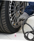Person using Heavy Duty Vacuum Tire Repair Nail Set With Sharp Cutter Blades And Tough Rubber Screw Plugs For Cars And Trucks Quick Puncture Fix.