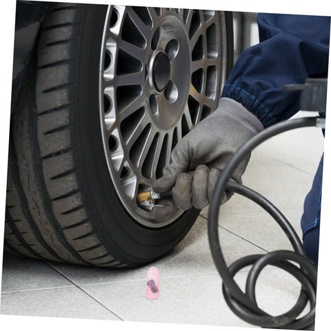 Person using Heavy Duty Vacuum Tire Repair Nail Set With Sharp Cutter Blades And Tough Rubber Screw Plugs For Cars And Trucks Quick Puncture Fix.