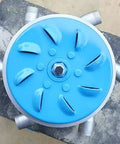 Top view of a blue 3kW 110V To 230V hydroelectric water turbine generator with six nozzles for outdoor use.