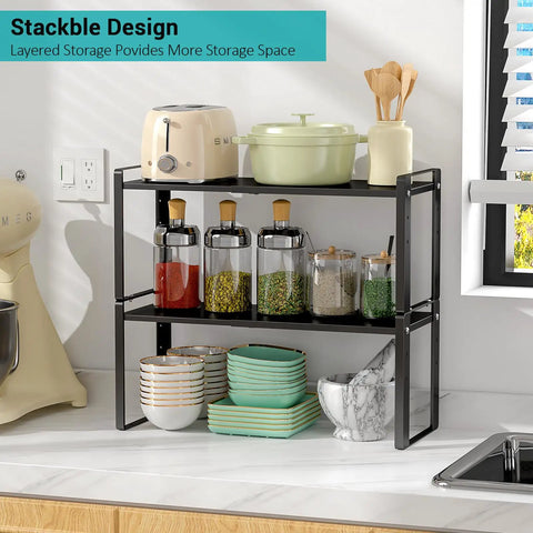 Stack Your Pantry Goods Without A Sweat, 2 Pack Expandable Cabinet Organizer Shelves, adjustable black metal kitchen rack with jars and dishes.