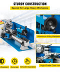 Rock Solid Compact Metal Lathe Seven By Fourteen Inch Bed with heavy cast iron frame and aluminum alloy handwheel for machining.