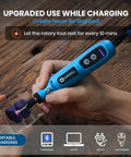 Hella Versatile Mini Cordless Rotary Tool With Five Speed Settings Up To Fifteen Thousand Rpm And A Knockout Forty Three Piece Accessory Kit For Engraving Drilling Sanding And Detailing in use while charging, showcasing portable features.