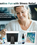 Person creating art with Coastal Sea Resin Art Kit For Teens And Adults With UV Light All-Inclusive Beginner Friendly DIY Beach Craft Gift Set For Coastal Decor Glowing Ocean Scene Frames Pigments And Tools Included