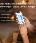 Smart TLC2206 WiFi Tank Level Monitor For Water Oil And Fuel app interface on smartphone displaying liquid level readings.