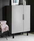 4 Pack 6 Inch Metal Cylinder Furniture Legs with M8 Screws Black Finish installed on modern cabinet