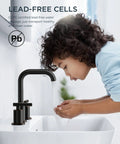 Child using Two Handle 8 Inch Widespread Oil Rubbed Bronze Bathroom Faucet With Metal Pop Up Drain And cUPC Supply Lines