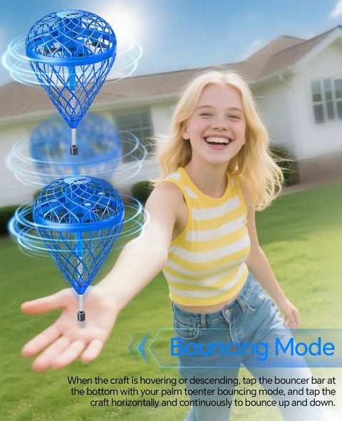 Child outdoors playing with the Hand Operated Mini Drone Magic Flying Orb Ball With Lights, demonstrating bouncing mode.