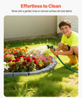 Child watering flowers bordered by Faux Stone Landscape Edging Kit No Dig Border For Lawn And Garden Flexible Stone Look Edging