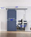 Installed brushed nickel sliding barn door hardware track kit, heavy duty rollers, 40-inch width, blue door in living room.