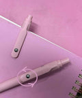 Pink Gel Pens 7 Pack 0.5mm Fine Point Quick Dry Black Ink Smooth Writing For Journaling Notes And Classwork on pink paper
