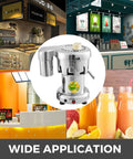 USZWBY Heavy Duty Cold Press Electric Juicer 370W Stainless Steel Centrifugal Juice Extractor in a restaurant setting.