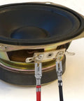 Red and black wires with spade terminals attached to speaker, part of 30 Piece Spade Crimp Terminal Kit With Insulating Sleeves And 20cm Wires