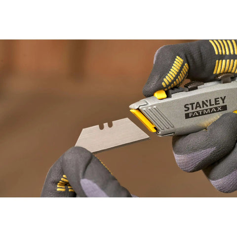 Gloved hands holding 2 In 1 Snap Off Knife Xtreme With Stainless Steel Blade Guide 9mm Width Quick Blade Change Via Notched Wheel No Tools Needed 2 7 16 Inch Blade 6 7 8 Inch Handle Gray showing blade removal