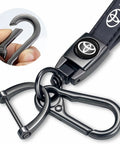 Premium Leather Car Keychain Set For Toyota Corolla RAV4 Highlander showing vintage zinc alloy clips and key strap detail.