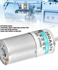 XD-25GA370 DC Gear Motor With Metal Gearbox shown in a compact durable design next to electronic equipment.