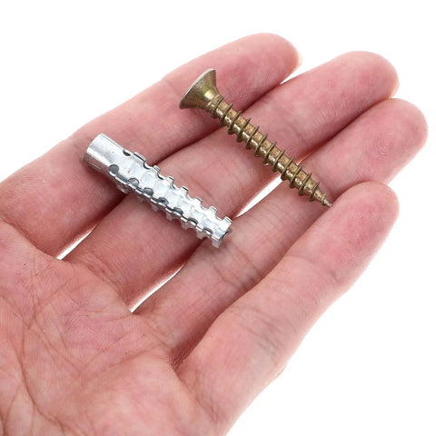 Hand holding Drywall Anchors and Screws Kit 40 Sets Heavy Duty Rust Proof Steel Construction for Concrete