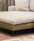 Close-up of sofa with 4 Pack Adjustable Table Legs With Caster Wheels For Cabinet And Bed In Cold Rolled Steel Built Beefy And Stable