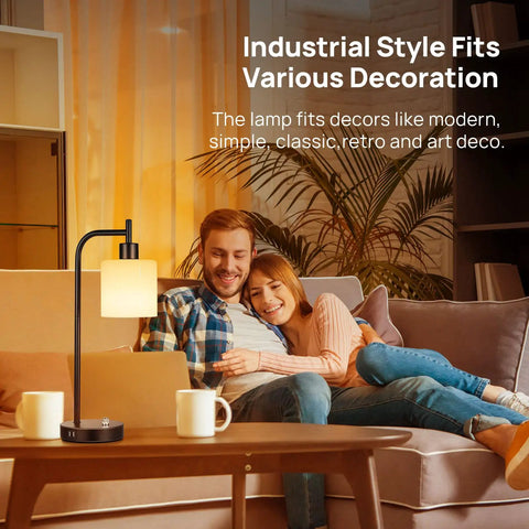 Couple on couch with Dope Industrial Table Lamp Set Of 2 with Stepless Dimming USB Ports, Glass Shade beside them