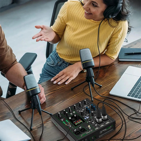 Two people using the ProFX6v3 6 Channel Analog Mixer With USB Audio Interface Onyx Preamps And EQ GigFX Effects Engine Bluetooth