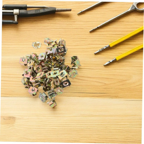 Heavy Duty Golden U Nut Fasteners For Truck And Rig 50 Pack on wood surface, showing nut clips for secure mounting.