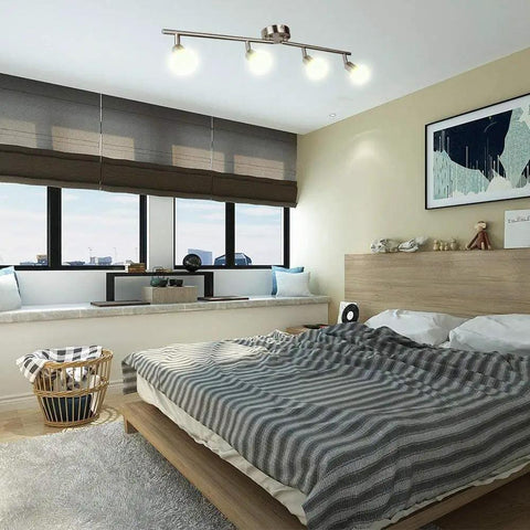 Sleek Modern LED 4-Light Track Lighting Kit With Flush Mount installed on bedroom ceiling, adjustable spotlights enhancing decor.