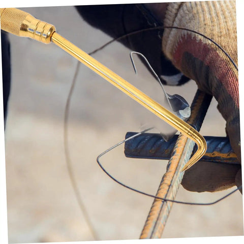 Golden Portable Tie Tool With Hook For Quick Fence Tying On Job Sites Pro Grade Wire Twisting Tool With Textured Grip shown in use