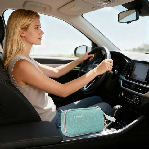 Woman driving car with Insulin Cooler Travel Case With EVA Insulation And Two Ice Packs For Diabetes Care in the center console.