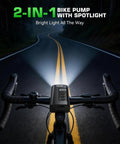 2 In 1 Mini Electric Bike Pump With LED Headlight And Digital Gauge mounted on bike handlebars at night
