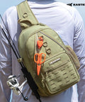 Karryall Sling Tackle Bag For Fishing with rod holder, MOLLE system, shown on person wearing white shirt, outdoors.