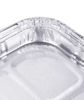 Close-up of 25 Pack 1/4 Size Cookie Sheet Baking Pans 12.8 By 8.9 Inch Heavy Duty Nonstick Aluminum Foil Trays showing corner detail