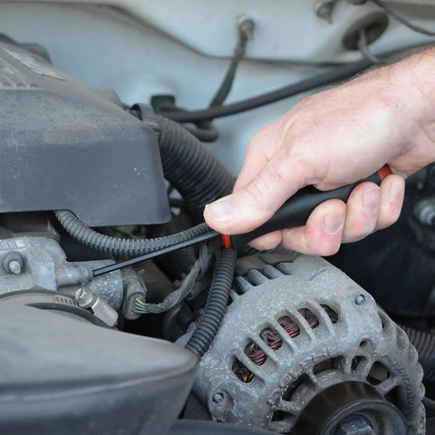 Hand using Ergonomic Comfort Grip Balldriver Screwdrivers Set One And A Half To Five Millimeters in engine maintenance