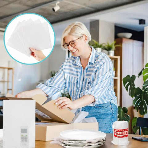 Woman using Move Day Must Have Dish Packing Kit That Hits Hard On Protection With 320 Foam Pouches And Sheets In Four Sizes