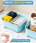 Mini Low Profile Rubber Caster Wheels 0.5 Inch, Self Adhesive And Screw Mounted Fixed Casters For Furniture And Appliances, No Sweat Setup Delivers A Slick Smooth Glide, Smart Mobility Hack For Desk Organizers And Storage Bins, Orange 16 Pack in use on a blue tray holding lightweight items.