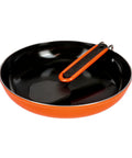 Summit Skillet Nonstick Camping Cookware For Backpacking Stoves with orange rim and nestable turner inside the pan