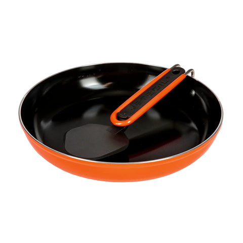 Summit Skillet Nonstick Camping Cookware For Backpacking Stoves with orange rim and nestable turner inside the pan