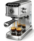 Compact Stainless Steel Espresso Machine With 20 Bar Pump And Pro Steam Wand making espresso shots in clear cups.