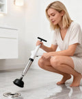 Clear Out Messy Blockages No Sweat With This Rechargeable Electric Plunger Built For Toilets Sinks And Floor Drains Plus An Ergonomic Grip That Makes Heavy Duty Work Smooth in use near a drain.