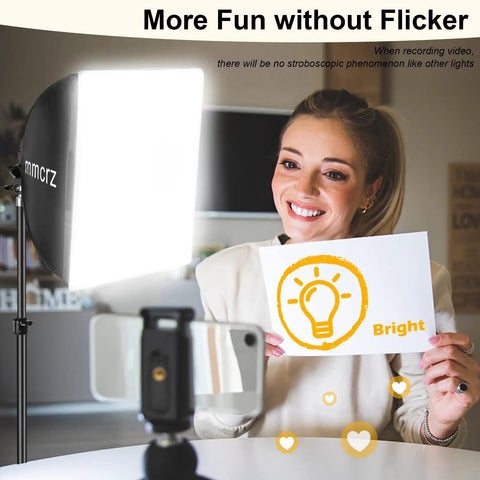 Woman using 2 Pack Professional Softbox Lighting Kit 16x16 Studio Lights for photography, showing bright and even illumination.