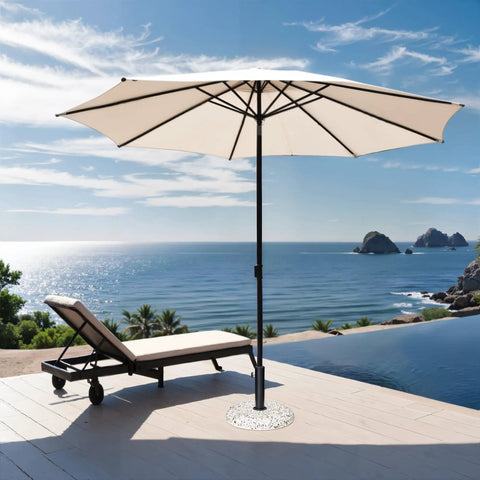 45Lbs Concrete Umbrella Base With Cobblestone Decor Heavy Duty Outdoor Umbrella Stand For Deck Poolside Yard Stable Concrete Counterweight Keeps Your Umbrella Upright in use by a poolside lounge chair with ocean view.