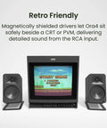 ORA4 Powered Bluetooth Desktop Speakers Pair Matte Black with retro CRT monitor setup