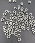 100 Pieces M4 0.7 Hex Nut Stainless Steel 304 18 8 Hexagon Nut For Bolts Bright Finish Full Thread scattered on surface