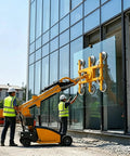 Heavy Duty Vacuum Glass Lifter With Powerful Electric Suction Grippers For No Sweat Large Panel Install and Commercial Job Site Handling Gear quick setup used by workers installing glass panels.