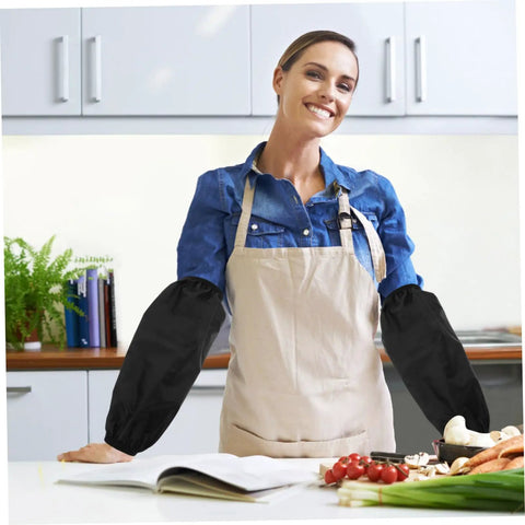 Heavy Duty Extended Arm Sleeve Covers For Men And Women, Dope Oil Resistant Protective Oversleeves In Matte Black worn while cooking.